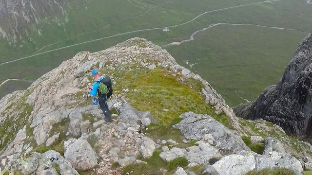 143 Kieran heading down over Great Gully Buttress.jpg