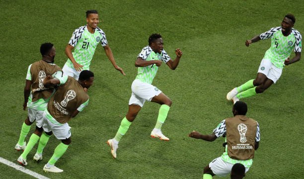 ahmed-musa-of-nigeria-celebrates-with-team-mates-after-scoring-his-picture-id981253806.jpg