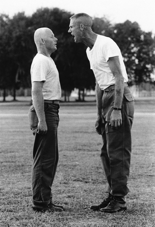 a-drill-instructor-administers-his-brand-of-shock-treatment-to-a-new-marine-recruit-on-october-20-1971.jpg