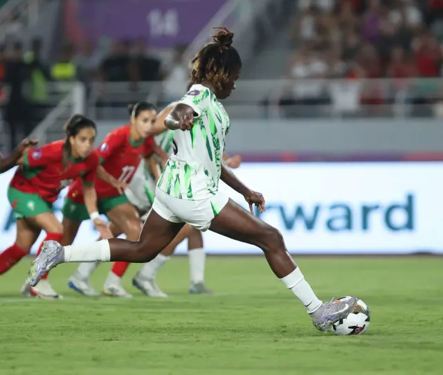 okoronkwo-ijeoma-esther-of-nigeria-scores-penalty-during-the-2024-womens-africa-cup-of-nations-final-match-between-morocco-and-nigeria.webp