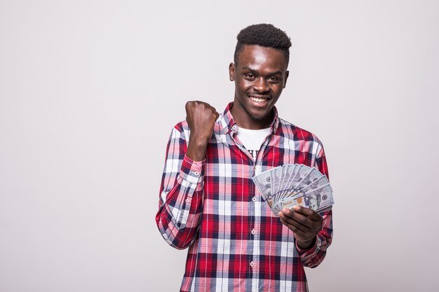 portrait-happy-excited-african-man-holding-bunch-money-banknotes-looking-isolated_231208-5530.jpg