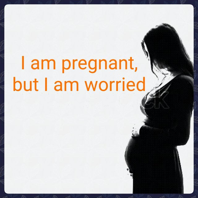 pregnant-woman-standing-against-window-600w-570666901_1.jpg