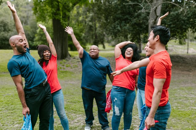 group of people with hands up.jpg