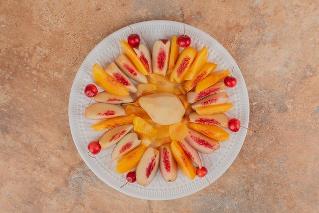 sliced-peaches-marble-table-decorated-with-cherries_114579-14729.jpg