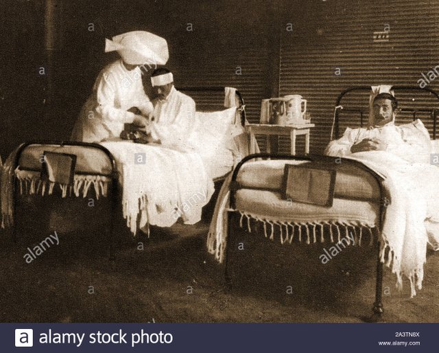 wwi-a-sister-tending-wounded-british-soldiers-at-an-army-hospital-near-the-front-in-france-2A3TN8X.jpg