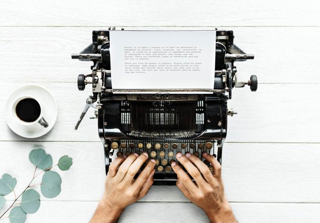 aerial-view-man-typing-retro-typewriter_53876-11978.jpg