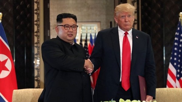 trump-kim-jong-un-firma-8.jpg