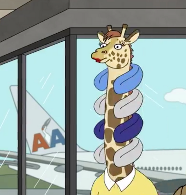 giraffe with neck pillows.png