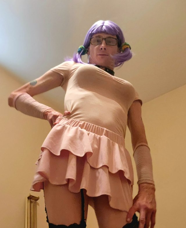 Slutt with a pink mini skirt and no panties .jpg