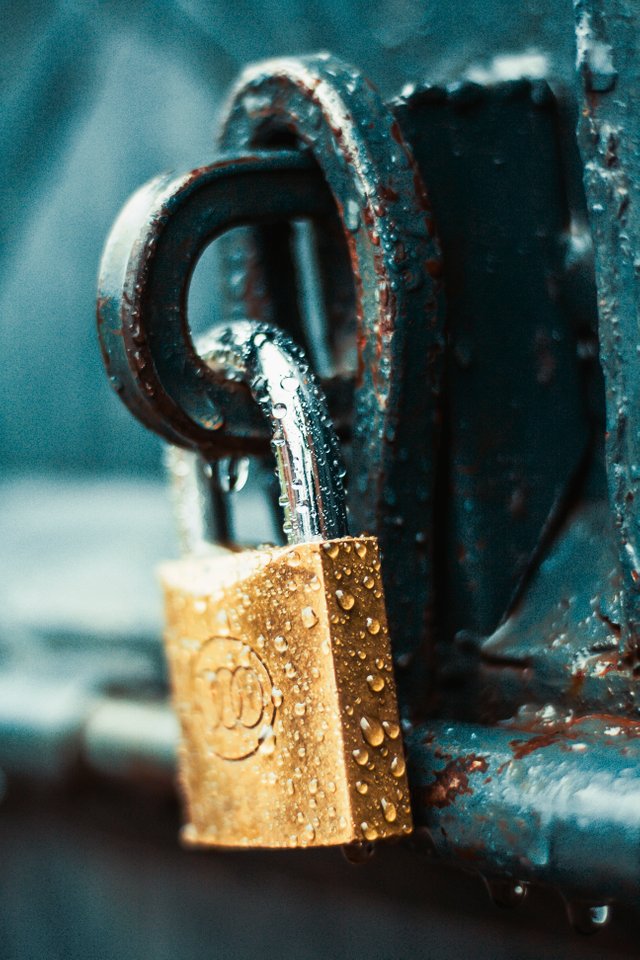 close-up-photography-of-wet-padlock-1068349.jpg