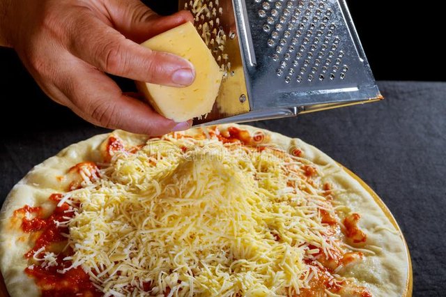 preparation-dough-male-hands-rubbed-cheese-grated-pizza-cooking-male-hands-rubbed-cheese-grated-pizza-cooking-130018666.jpg