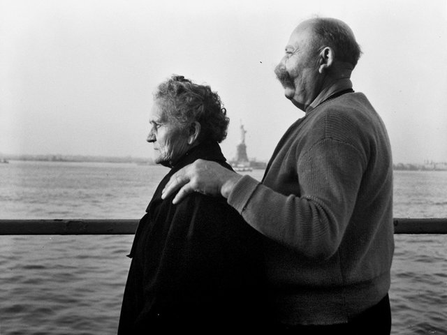 mr-and-mrs-paul-roerich-from-bavaria-germany-look-out-from-the-stern-of-a-boat-carrying-refugees-in-new-york-harbor-on-october-28-1956.jpg