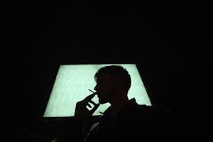 free-photo-of-silhouette-of-a-man-smoking-a-cigarette.jpeg