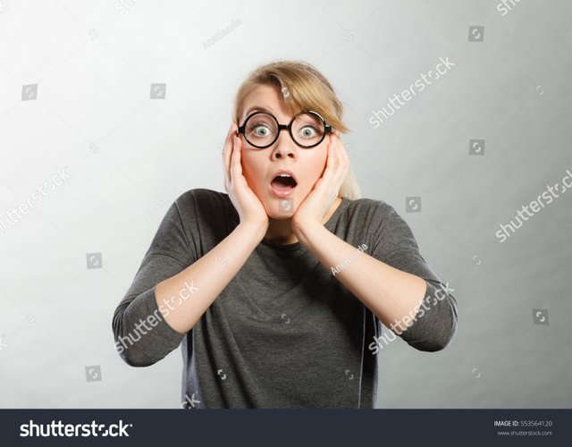 stock-photo-shock-and-disbelief-concept-surprised-astonished-girl-with-wide-open-mouth-amazed-female-looking-553564120.jpg