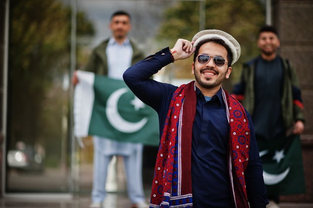 group-pakistani-man-wearing-traditional-clothes-salwar-kameez-kurta-with-pakistan-flags.jpg