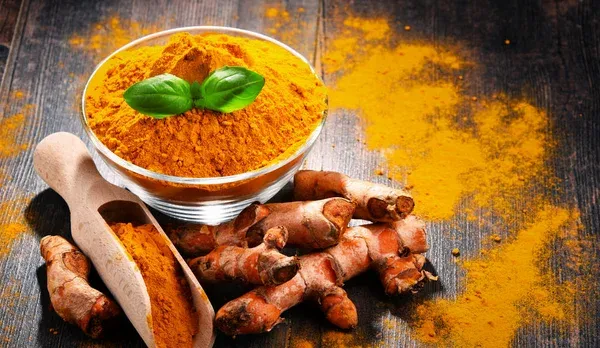 depositphotos_174978484-stock-photo-composition-with-bowl-of-turmeric.jpg