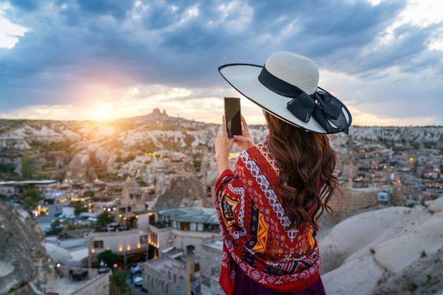 woman-take-photo-with-her-smartphone-goreme-cappadocia-turkey_335224-562.jpg