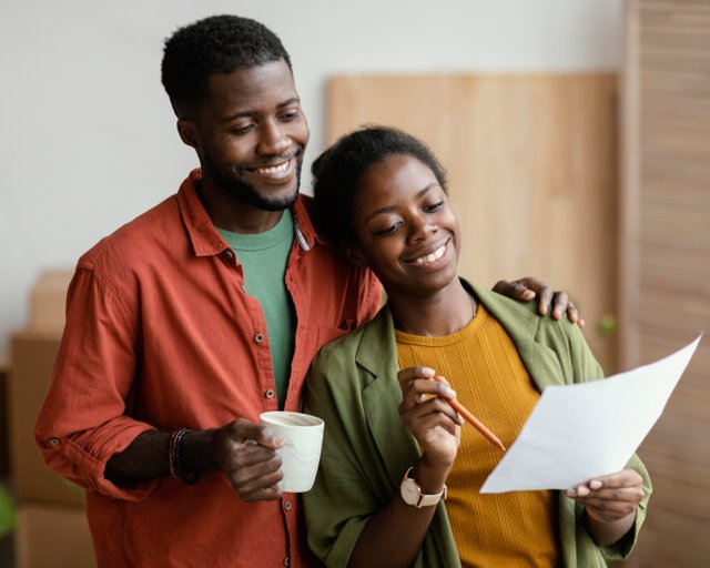 smiley-loving-couple-planning-redecorating-home.jpg