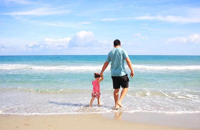 father-daughter-beach-sea-38302.jpg