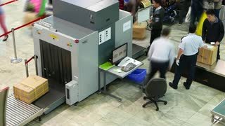 luggage-security-scan-using-x-ray-machine-airport-safety-check-time-lapse_v2aoxfd8x__S0000.jpg