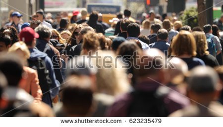 stock-photo-crowd-of-people-walking-street-623235479.jpg