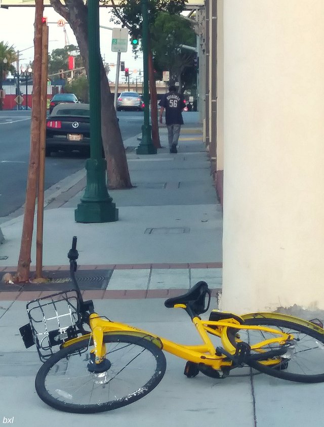 Abandoned dockless bike hazard San Diego California bxlphabet.jpg