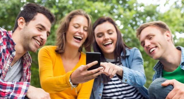 students-laughing-at-something-on-phone-on-shutterstock-800x430.jpg