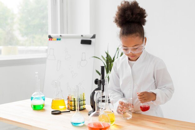 front-view-girl-scientist-experimenting-with-potions_23-2148571279.jpg