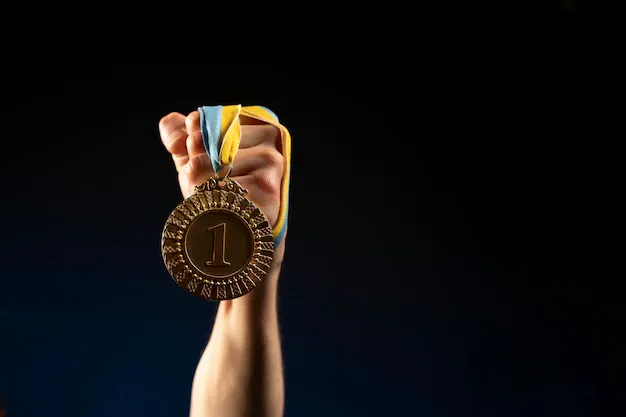 male-athlete-holding-medal_23-2148990964.webp