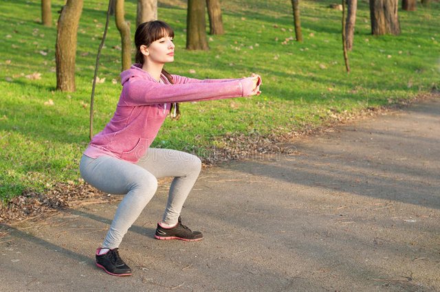 squat-exercises-strong-sporty-woman-doing-outdoors-fresh-air-park-sunny-spring-day-copy-space-41034958.jpg