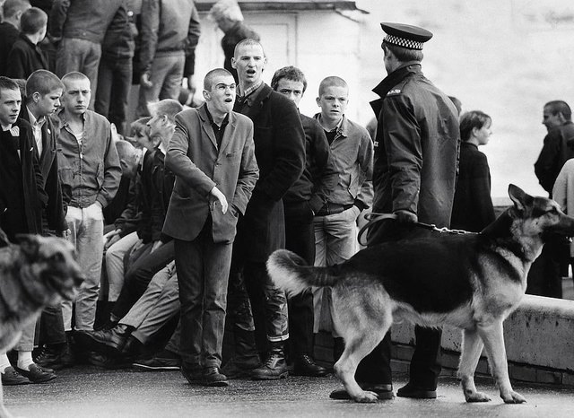 Working-class skinheads taunting police in Southend in 1981