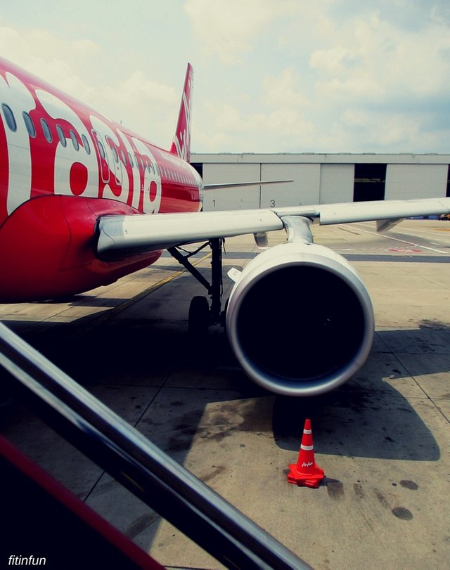 Air Asia wing view from the boarding stairs vehicle photography fitinfun.jpg
