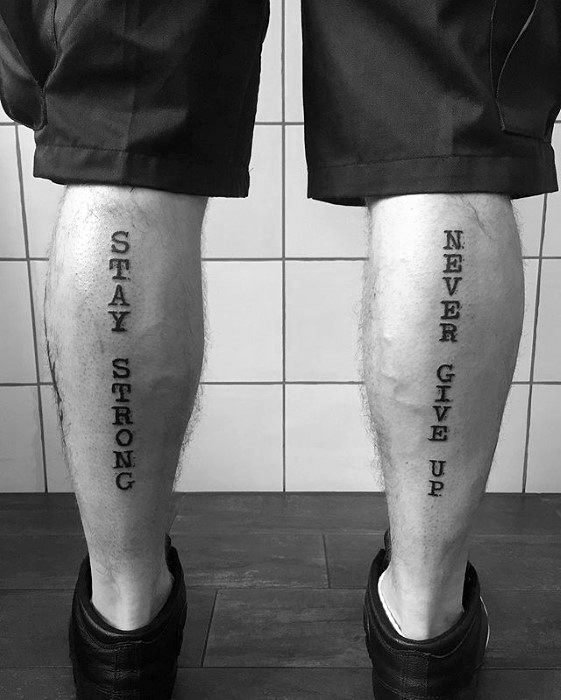 guy-with-never-give-up-tattoo-design-on-back-of-legs.jpg