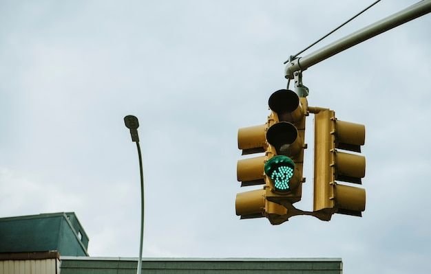 Free photo green traffic light above the_.. _ Free Photo #Freepik #freephoto #traffic-light #traffic #intersection #trafic-light.jpg