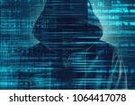 stock-photo-cybersecurity-computer-hacker-with-hoodie-and-obscured-face-computer-code-overlaying-image-1064417078.jpg
