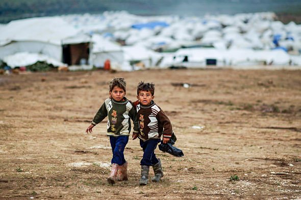 11-09-15-syrian-refugee-boys-590x393.jpg
