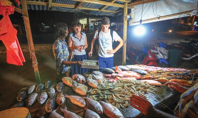 “What do we choose”, from a variety of fresh fish and jumbo prawns.jpg