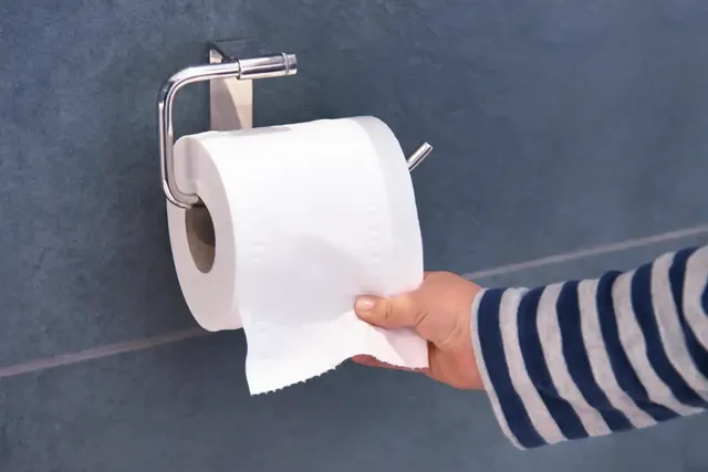 child-pulling-toilet-roll-846942858.webp