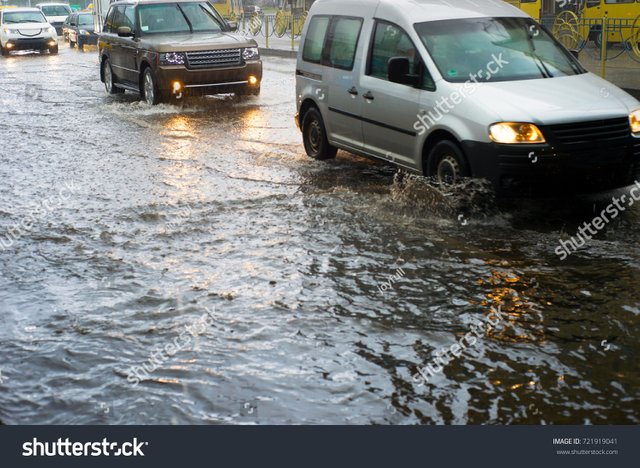 stock-photo-city-car-traffic-problem-in-a-heavy-rain-721919041.jpg