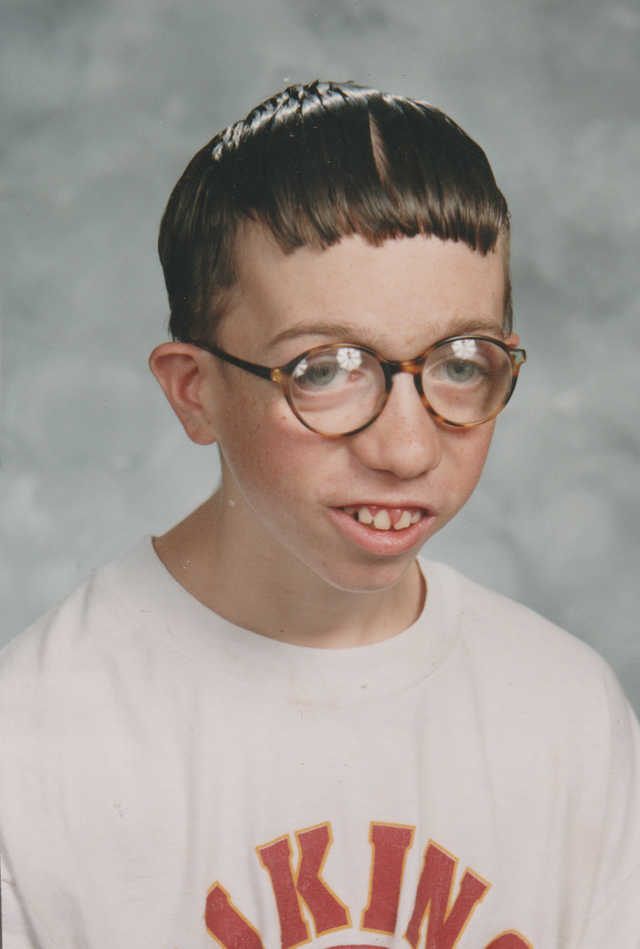 2000 maybe Joey White Shirt School Photo Wet Hair Skinny Smile.png
