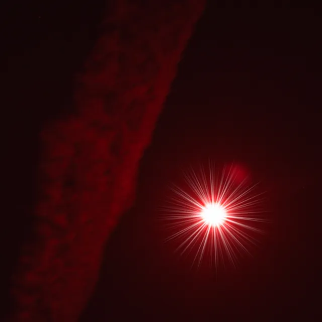 red-moon and contrail.webp