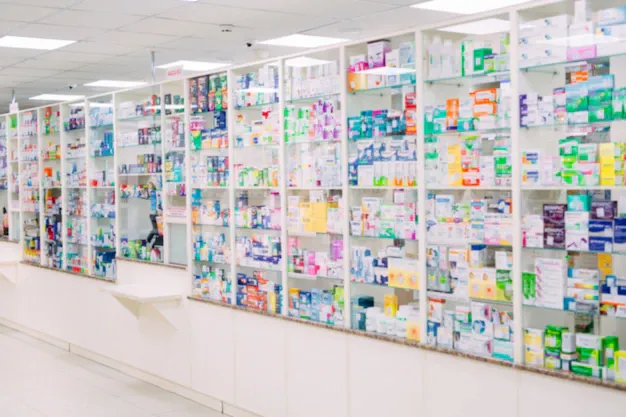 counter-store-table-pharmacy-background-shelf-blurred-blur-focus-drug-medical-shop-drugstore-medication-blank-medicine-pharmaceutics_109285-5942.webp