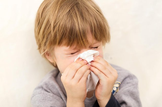 child-cold-flu-illness-tissue-blowing-runny-nose-29222844.jpg