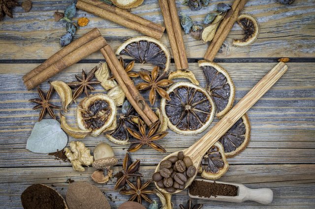 beautiful-arrangement-dried-lemons-cinnamon-coffee-wooden-spoons-wood_169016-3931.jpg