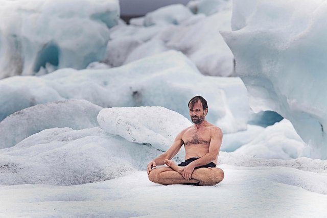 iceman-wim-hof-sitting-on-ice.jpg