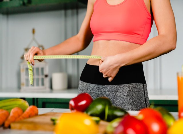 Woman-With-Tape-Measurer-.jpg