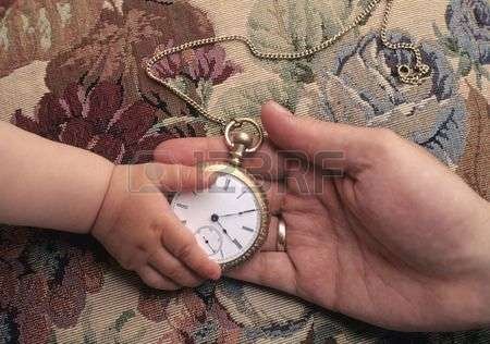 2418988-father-giving-child-antique-pocket-watch(1).jpg