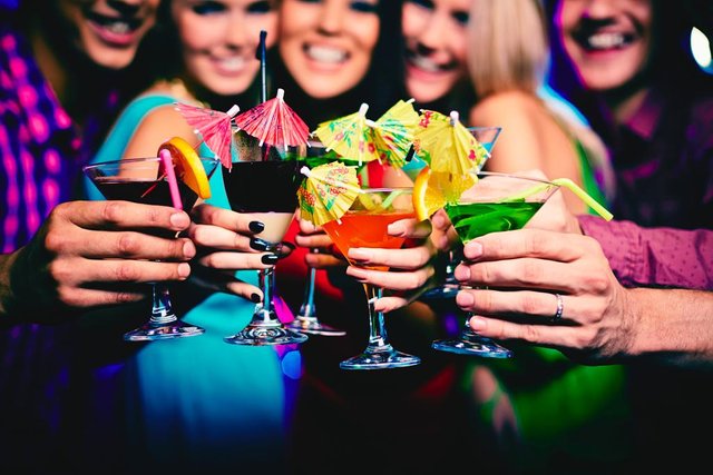 stock-photo-cocktails-held-by-happy-friends.png
