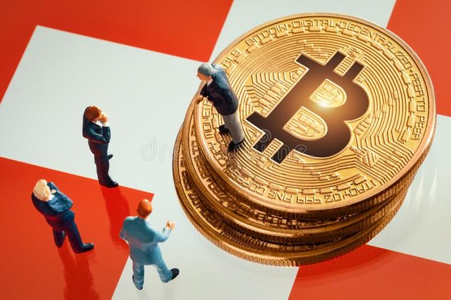 miniature-businessman-figurines-standing-near-pile-shiny-golden-bitcoin-switzerland-flag-business-meeting-217121727.jpg