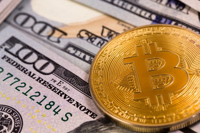 bitcoin_and_us_dollar-shutterstock_571550095.jpg
